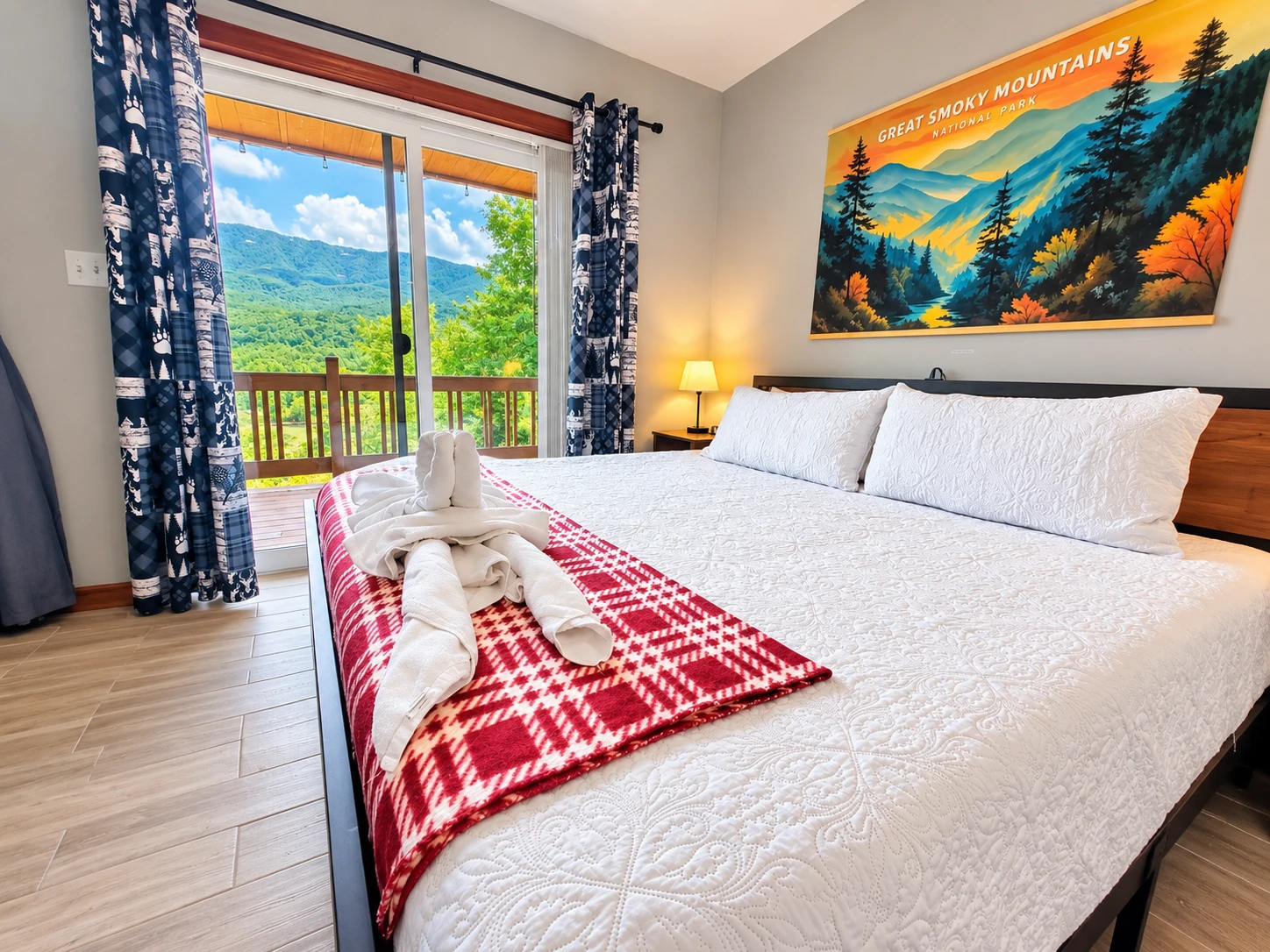 King size bed overlooking the mountains by the main living area