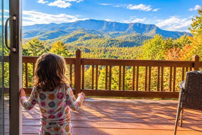 View of the mountains changing colors in the fall from the living room