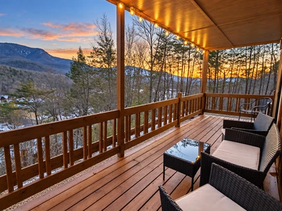 Sunset view from the 30-foot wide covered deck at Gatlinburg Landing