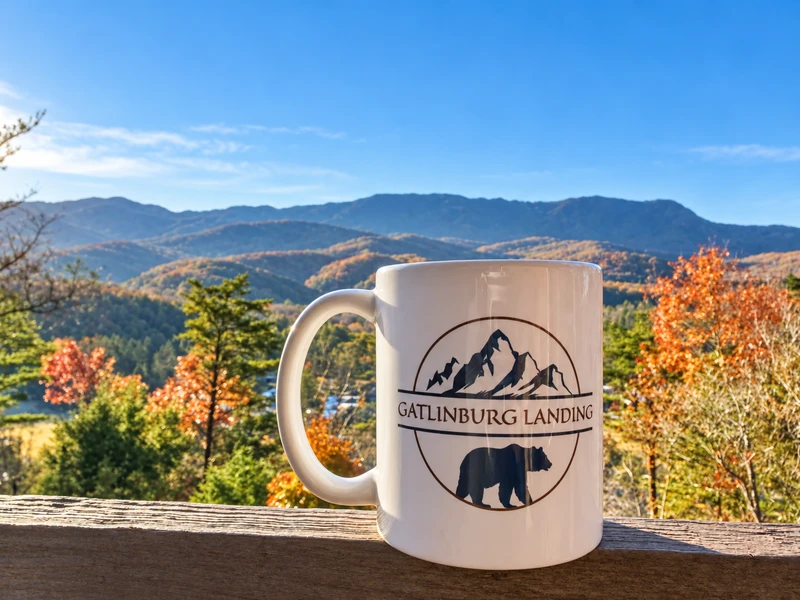 Enjoy coffee on the 30-foot wide covered deck while enjoying the mountain view at Gatlinburg Landing
