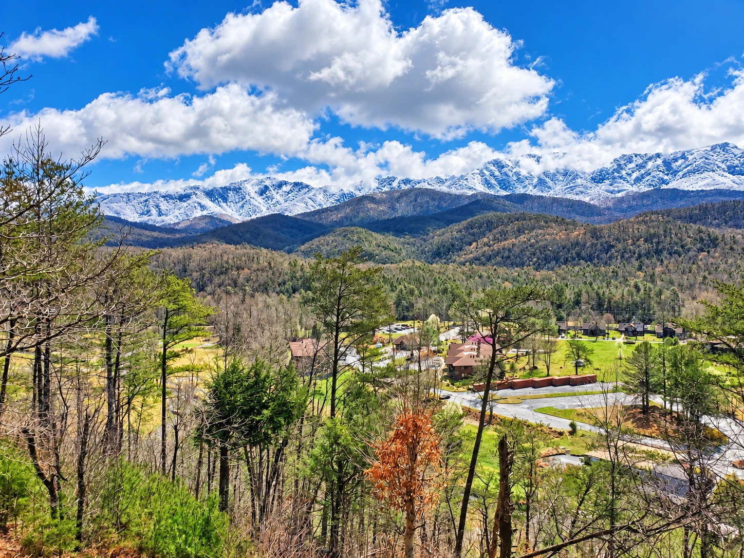 Snow capped mountains in late November from the covered deck at Gatlinburg Landing