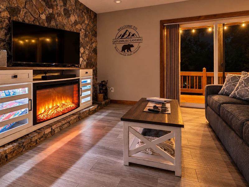Night ambiance with the electric fireplace and deck lighting