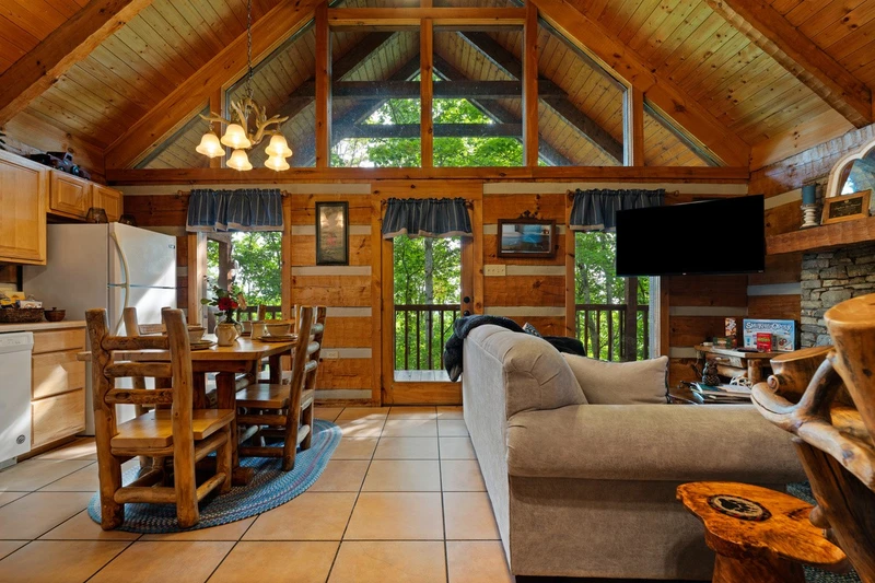 Living and dining area at Nestled Oaks cabin