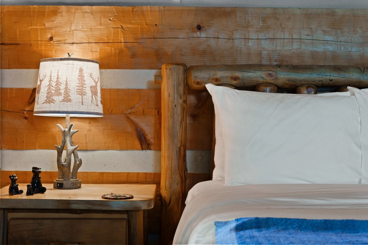 Bedside detail with soft linens