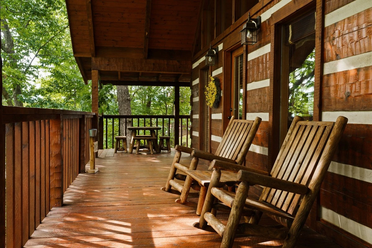 Deck with rocking chairs in the trees