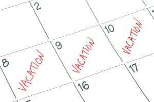 Part of calendar marked "vacation" in red