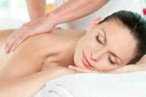 Woman relaxing and getting a massage at a spa