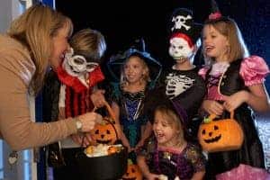 Kids dressed up for halloween on trick-or-treat