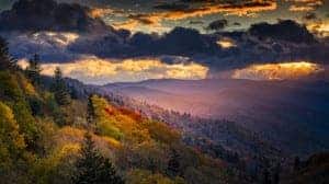 Ray of sunlight shining down on the Smoky Mountains at dawn
