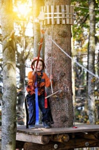 Boy on a ropes course