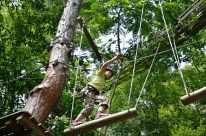 Girl on a ropes course