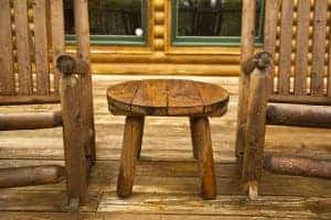 two rocking chairs on the back porch of a gatlinburg cabin