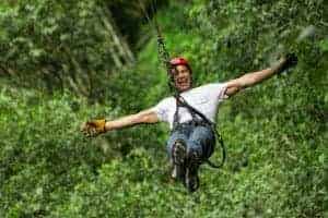 man zip lining in Pigeon Forge