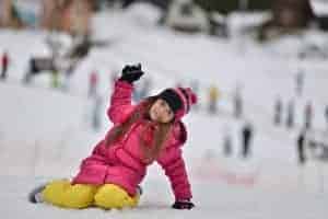 girl playing in snow at Ober Gatlinburg Ski Resort