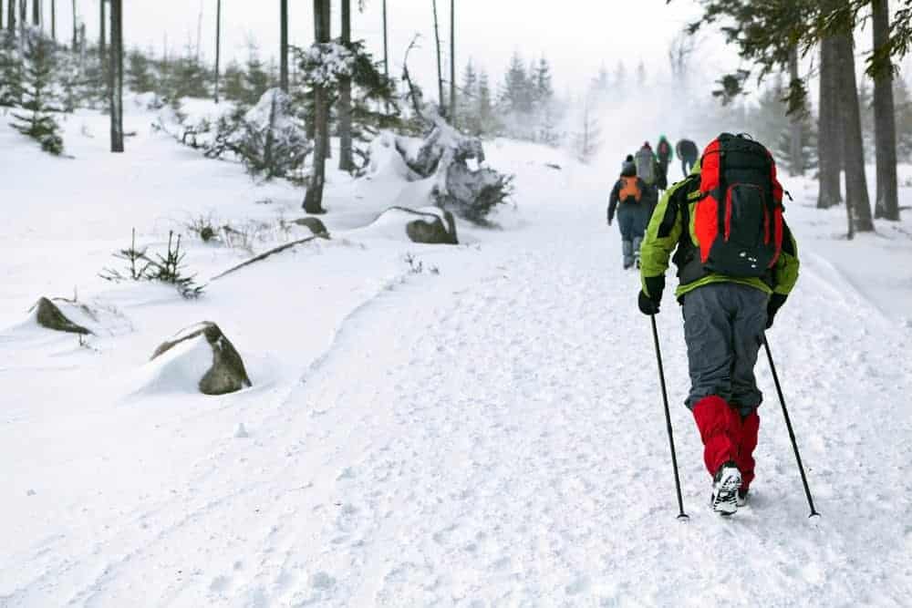 Hiking in the mountains in the snow