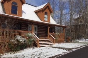 cabin in the smoky mountains covered in snow