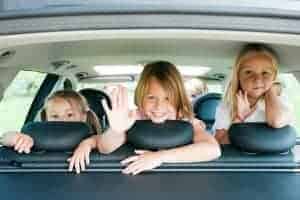 kids in the backseat on their way to a Smoky Mountains vacation