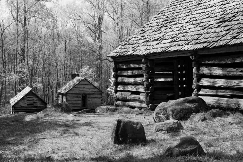 Black and white photo of an old homestead on the North Carolina side of the Smoky Mountains
