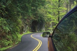 Car driving on a road through the Smoky Mountains