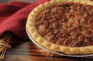 Entire pecan pie with a golden crust