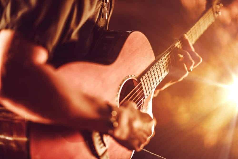 Man playing acoustic guitar