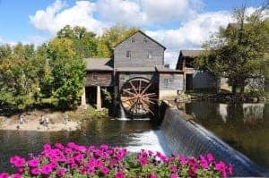 The Old Mill in Pigeon Forge with springtime flowers