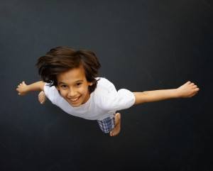 Boy enjoying a trampoline park, one of the indoor things to do in Pigeon Forge.