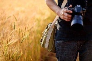 close up on person taking pictures of the Smoky Mountains