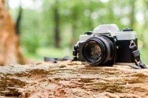 view of camera on rock taking pictures of the Smoky Mountains