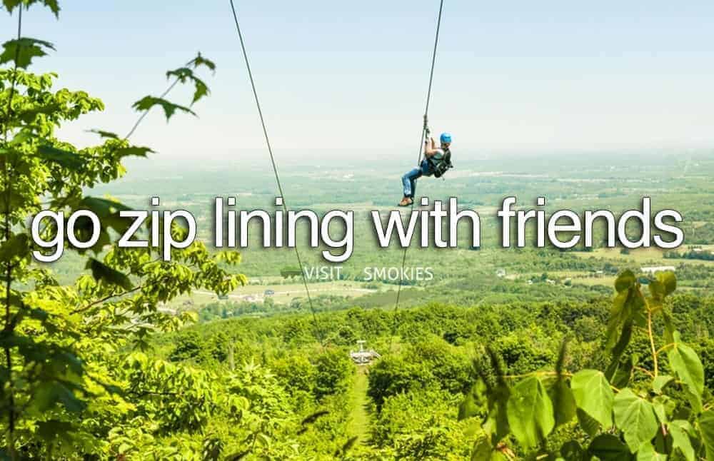 view of person zip lining in the Smoky Mountains