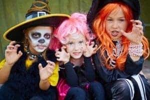 Young kids dressed up for Halloween.