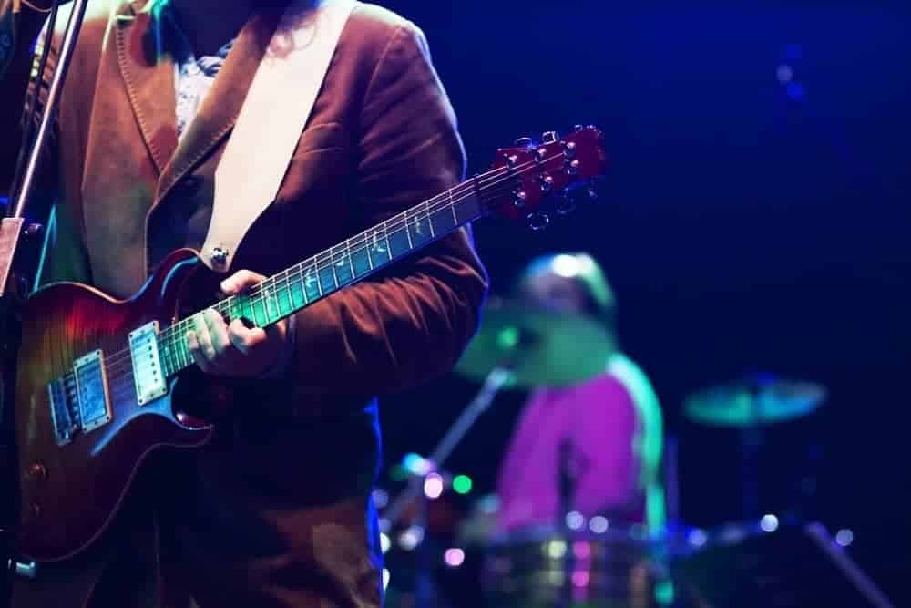 Guitarist on stage performing live music in Pigeon Forge.