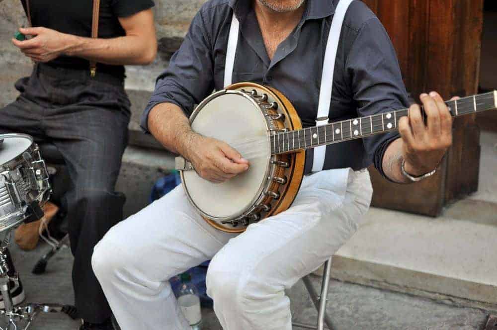 A man playing the banjo at a bluegrass festival in Sevierville.