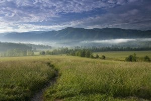 A hazy photo of Cades Cove in the Great Smoky Mountains National Park.