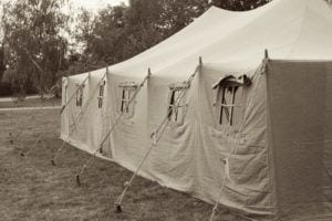 An enormous tent in the woods.