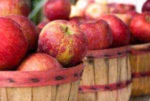 Baskets filled with red apples.