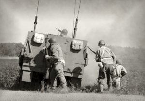 A black and white photo of soldiers in World War II.