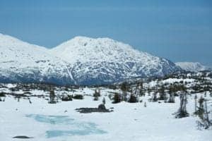 Snow covered mountains along the White Pass and Yukon Route.