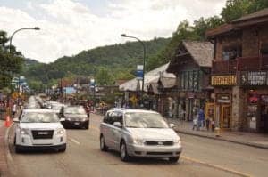 Cars on The Strip in downtown Gatlinburg.