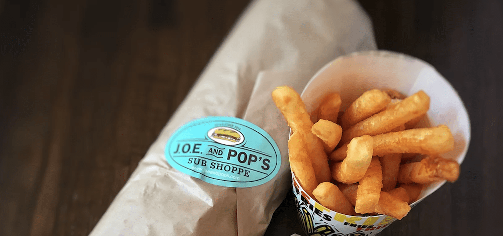 A sandwich and french fries at J.O.E. and Pop\'s Sub Shoppe.