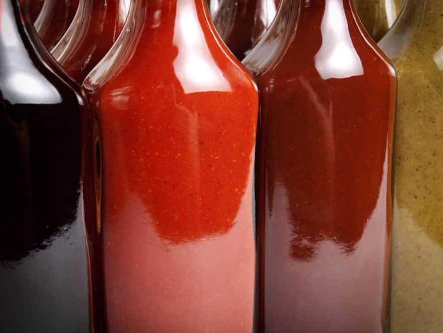 Bottles of hot sauce.