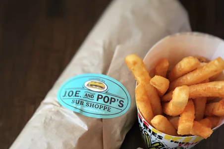 A sandwich and french fries at J.O.E. and Pop\'s Sub Shoppe.