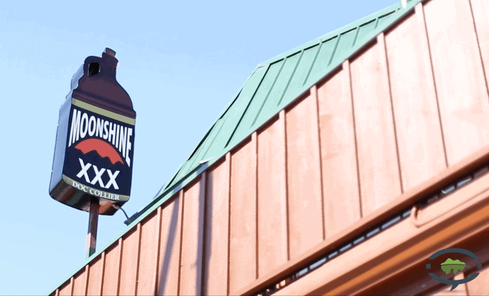 The Doc Collier Moonshine sign in the Smoky Mountains.