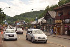 Cars driving through downtown Gatlinburg.