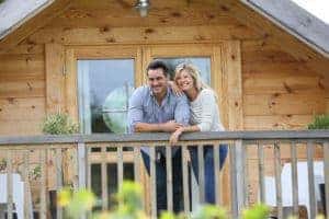 Romantic couple on the deck of their cabin.