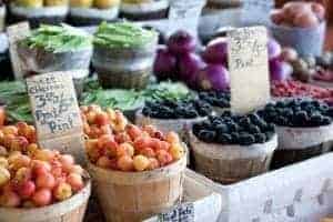 Fruits and vegetables for sale at a farmers market.