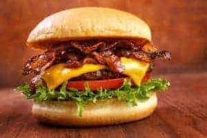 A tasty bacon cheeseburger.