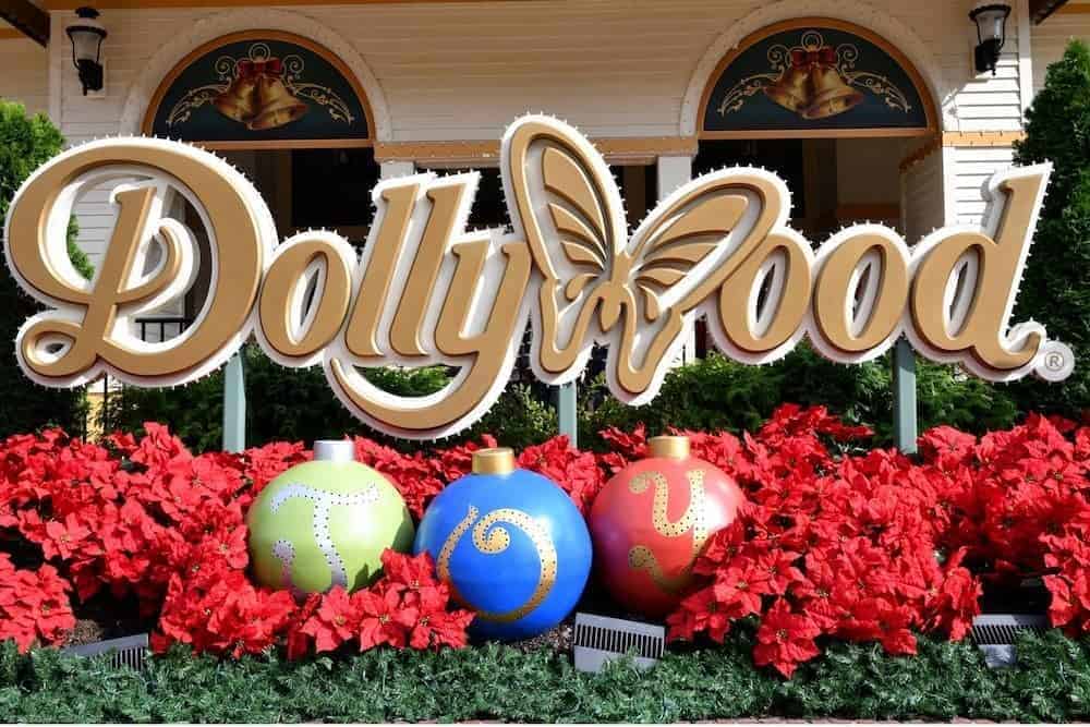The Dollywood sign surrounded by flowers.