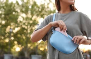 girl with fanny pack outside