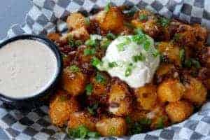 A serving of loaded tater tots,